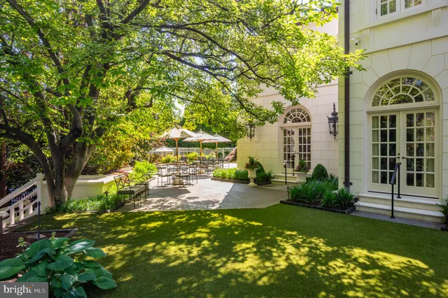 a view of a garden with a fountain