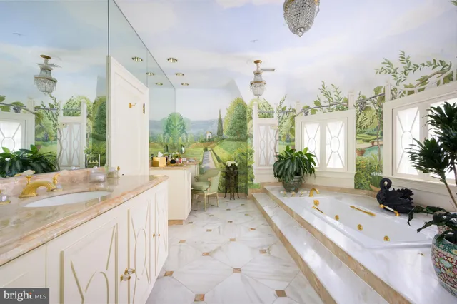 a spacious bathroom with a granite countertop double vanity sink a mirror and a shower