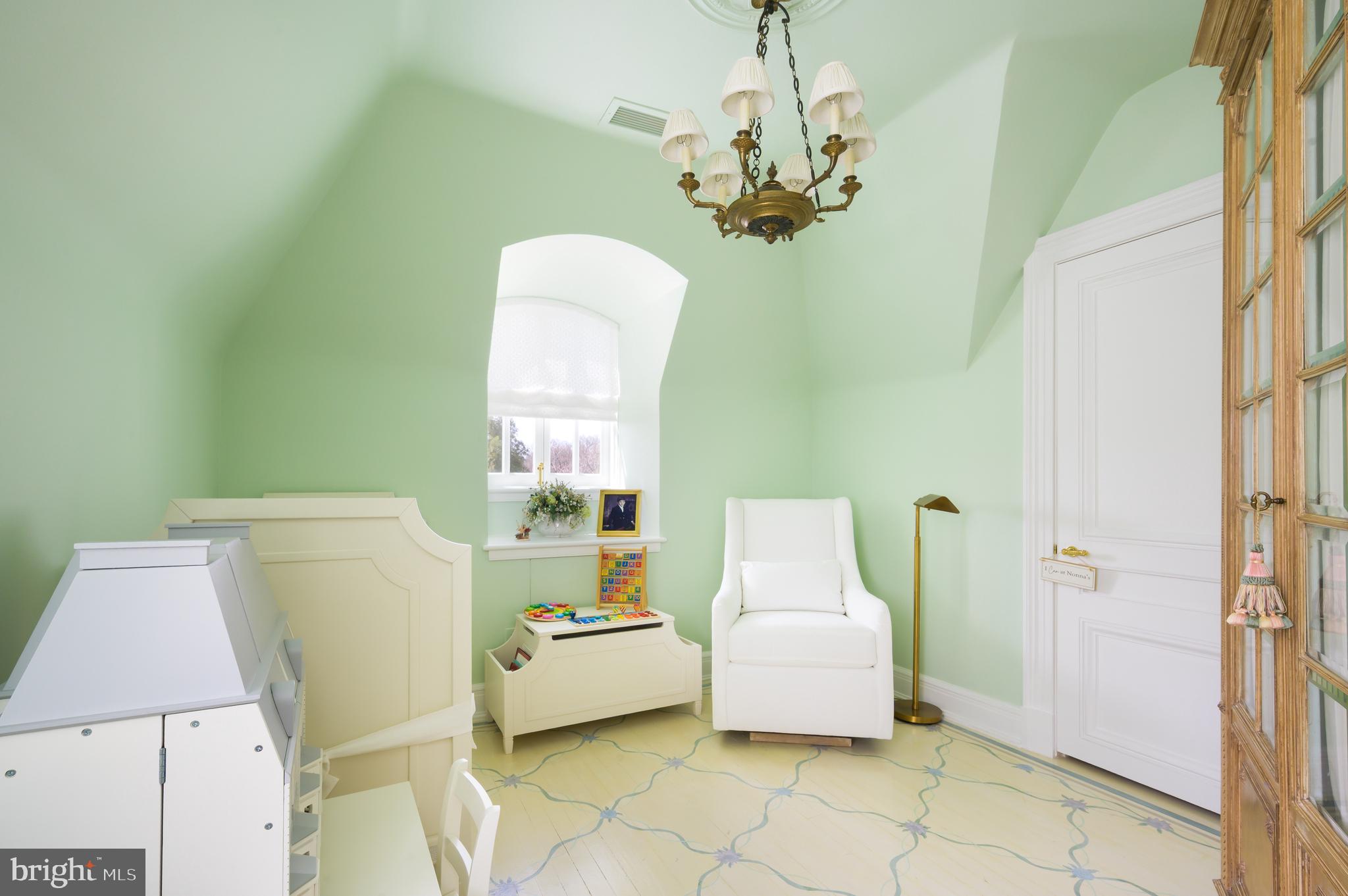 2838 McGill Terrace Northwest Washington, DC 20008 - Photo 44 of 50 a living room with furniture and a chandelier