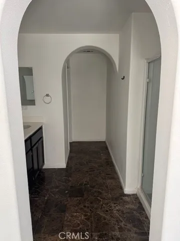 a view of livingroom with hardwood floor and a fireplace