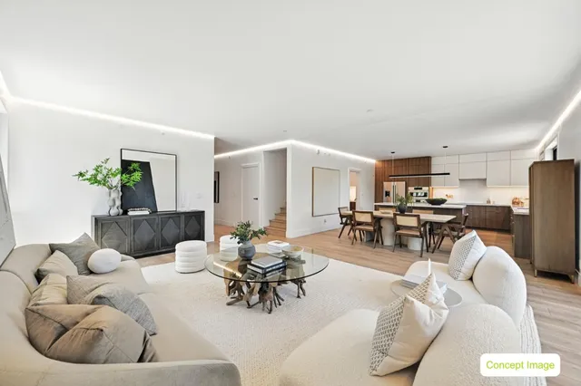 a living room with furniture and a table