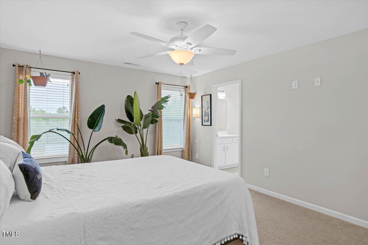 9834 Bitter Melon Drive Angier, NC 27501 - Photo 15 of 29 a view of a chandelier in a room