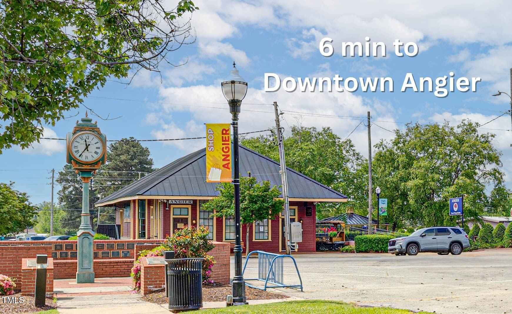9834 Bitter Melon Drive Angier, NC 27501 - Photo 27 of 29 a front view of a house with a garden