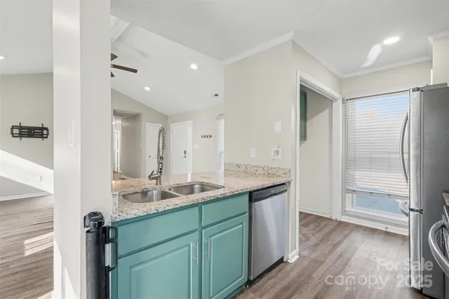 a bathroom with a granite countertop sink mirror and double