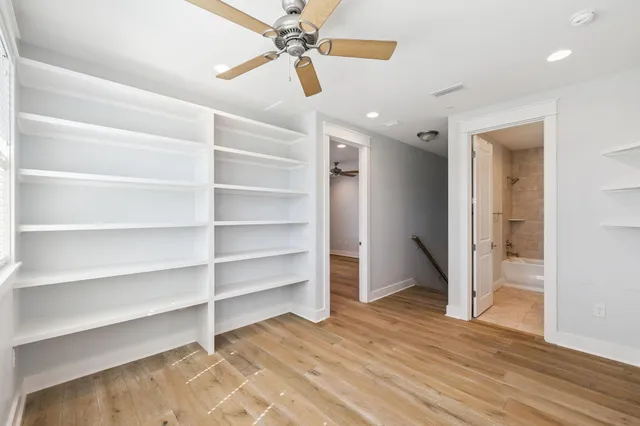 a bathroom with a sink a toilet and bathtub