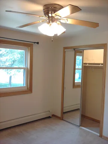 an empty room that has a window
