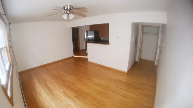 a view of a room with a flat screen tv