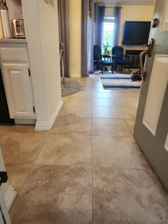 a view of living room with furniture and a flat screen tv