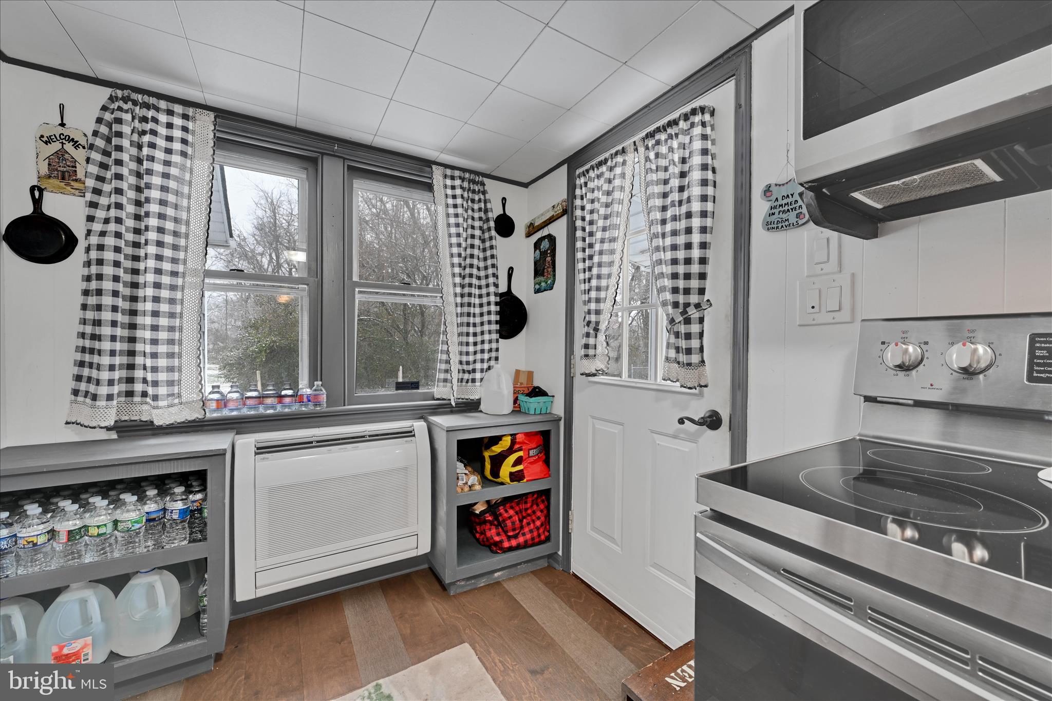 2440 Blue Ball Road Elkton, MD 21921 - Photo 17 of 30 a utility room with stainless steel appliances granite countertop a stove and a sink