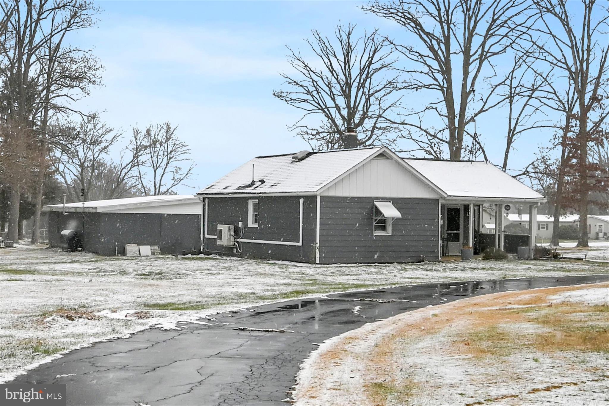 2440 Blue Ball Road Elkton, MD 21921 - Photo 6 of 30 a front view of a house with a yard and garage