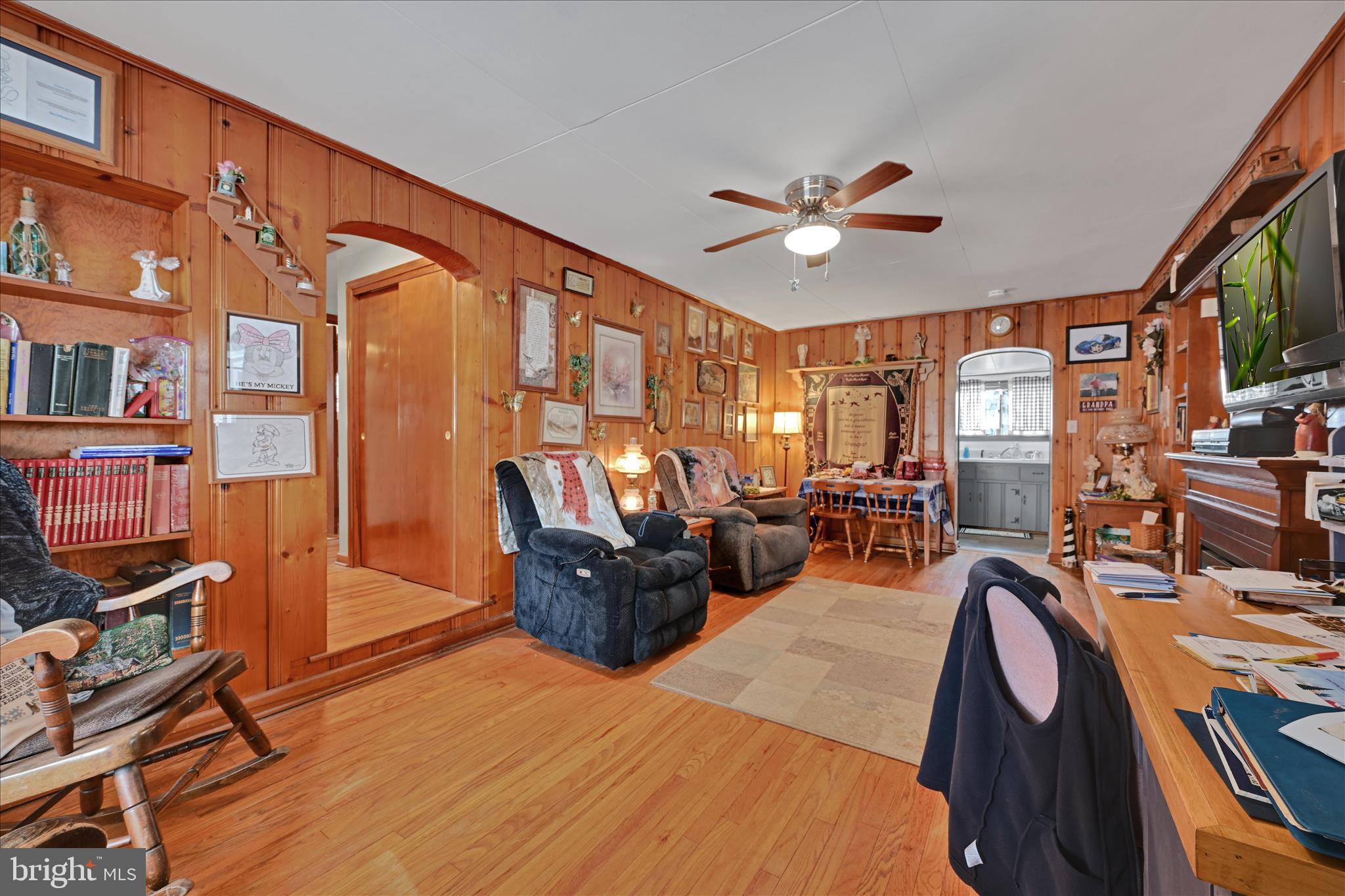 2440 Blue Ball Road Elkton, MD 21921 - Photo 9 of 30 a living room with furniture a ceiling fan and a rug