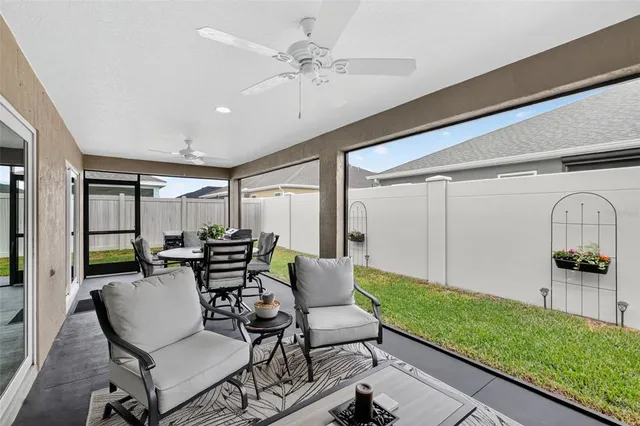 a view of a livingroom with furniture and window