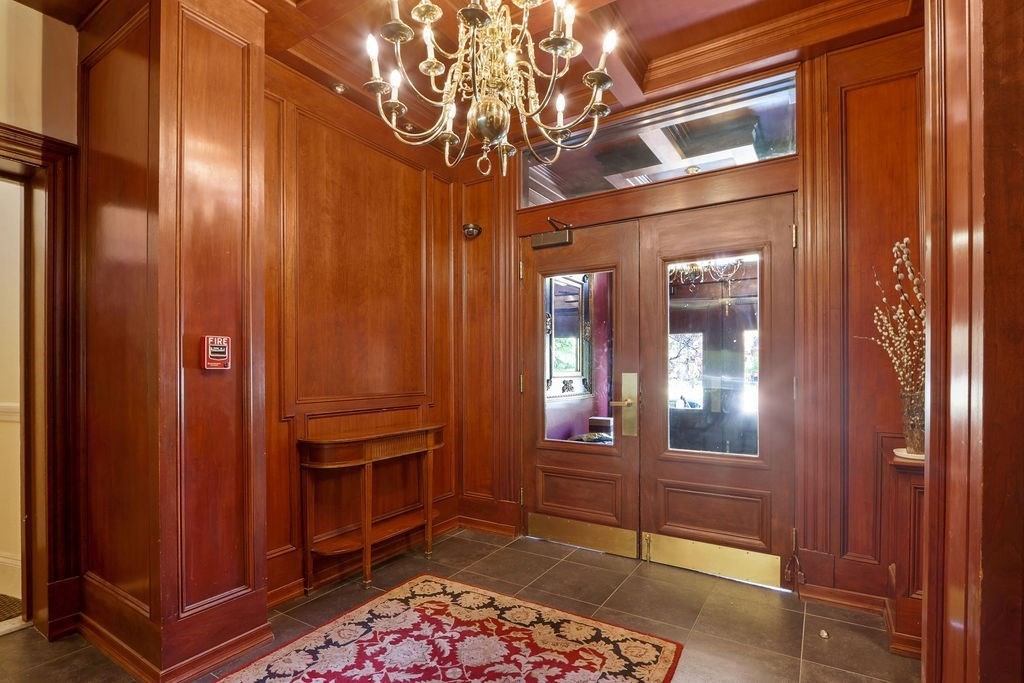 382 Commonwealth Avenue, Unit 24 Boston, MA 02215 - Photo 31 of 36 a view of a hallway with elevator