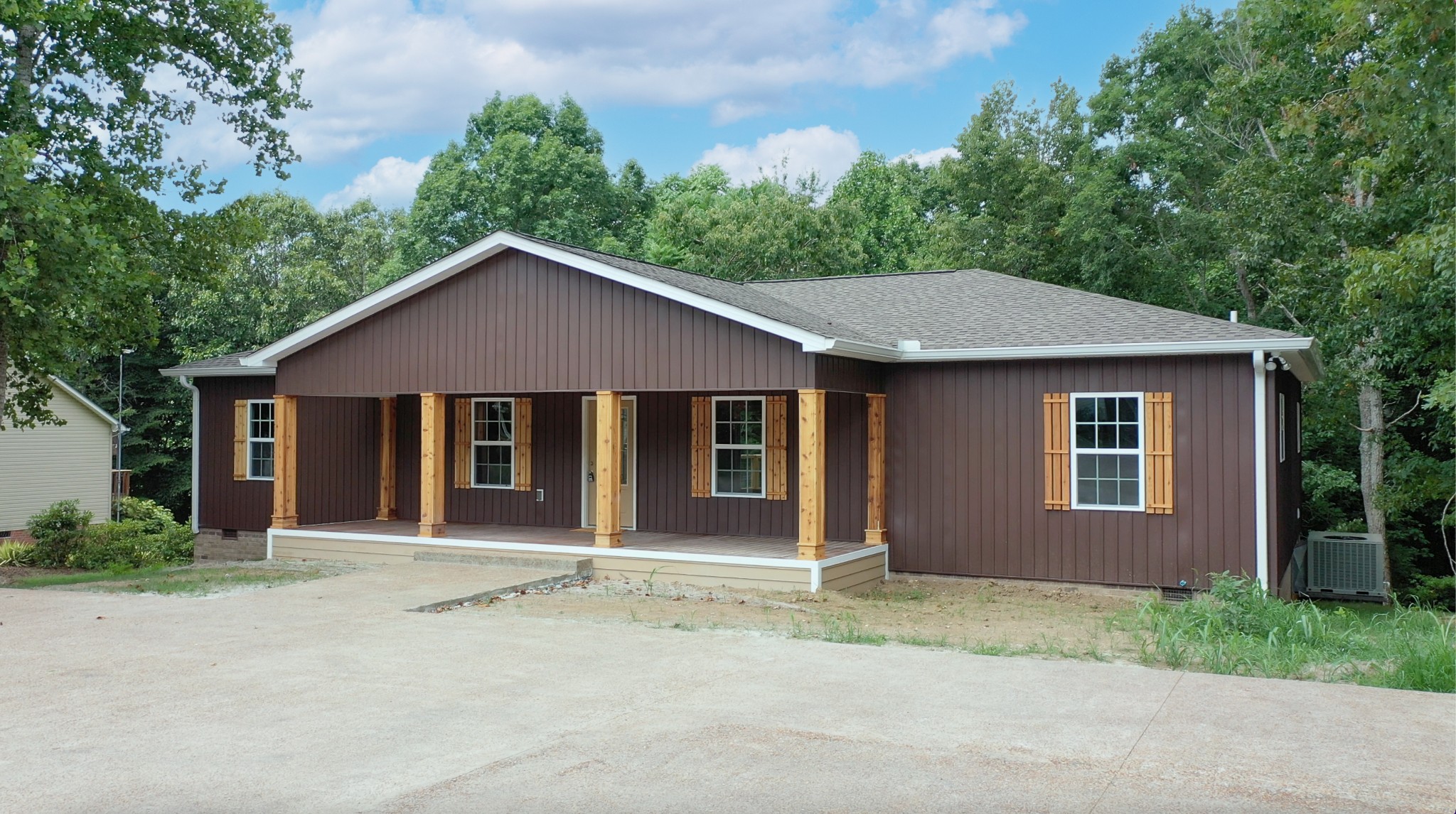 front view of a house with a yard