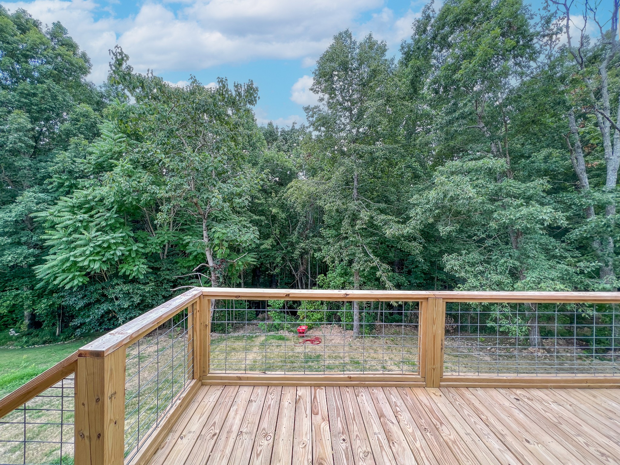 266 Lake Forrest Road Lynchburg, TN 37352 - Photo 32 of 40 a view of balcony with deck and trees