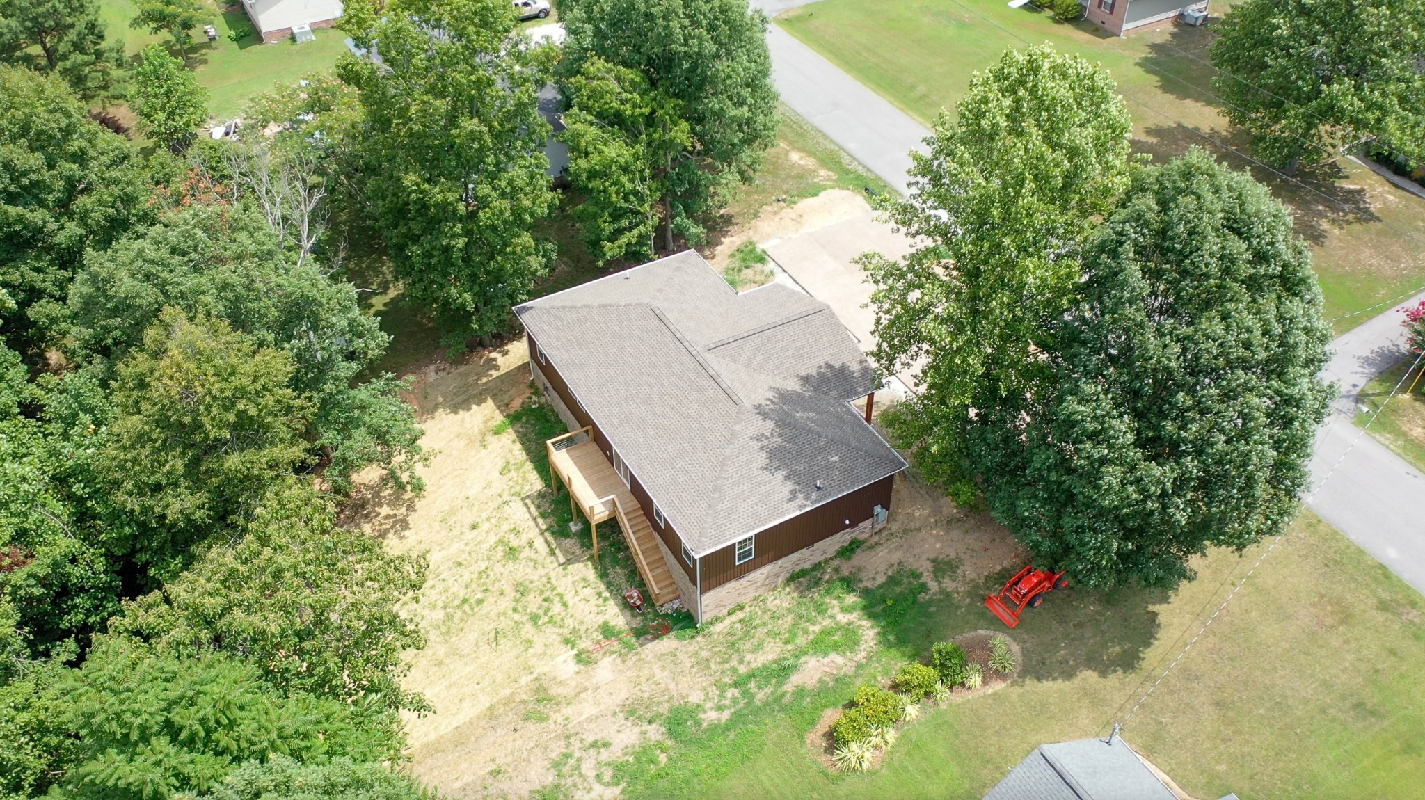 266 Lake Forrest Road Lynchburg, TN 37352 - Photo 8 of 40 an aerial view of a house with a yard and large trees