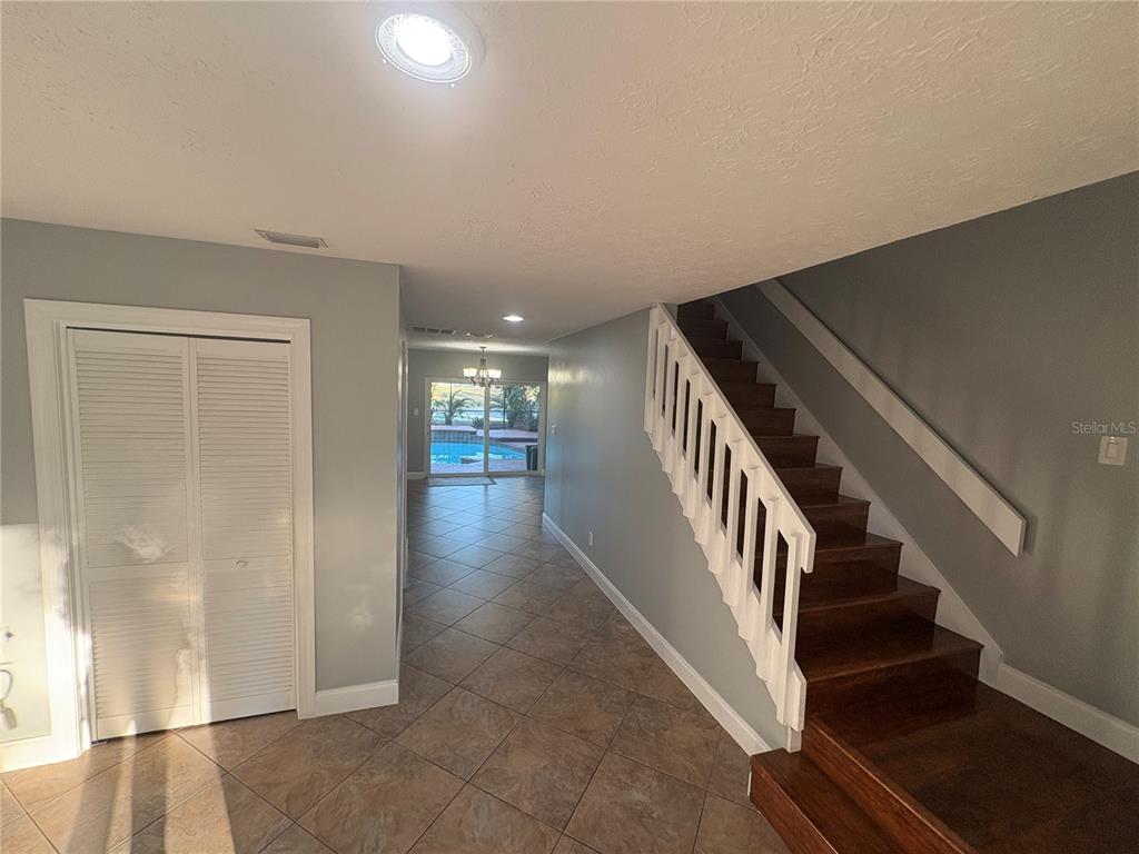3904 Sweetleaf Drive Brandon, FL 33511 - Photo 14 of 34 a view of entryway and hall with wooden floor