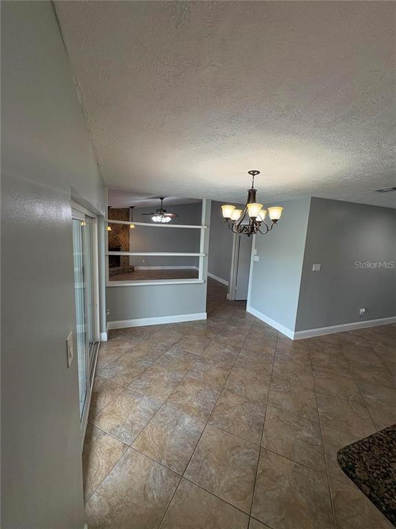 3904 Sweetleaf Drive Brandon, FL 33511 - Photo 18 of 34 a view of a hallway with a kitchen