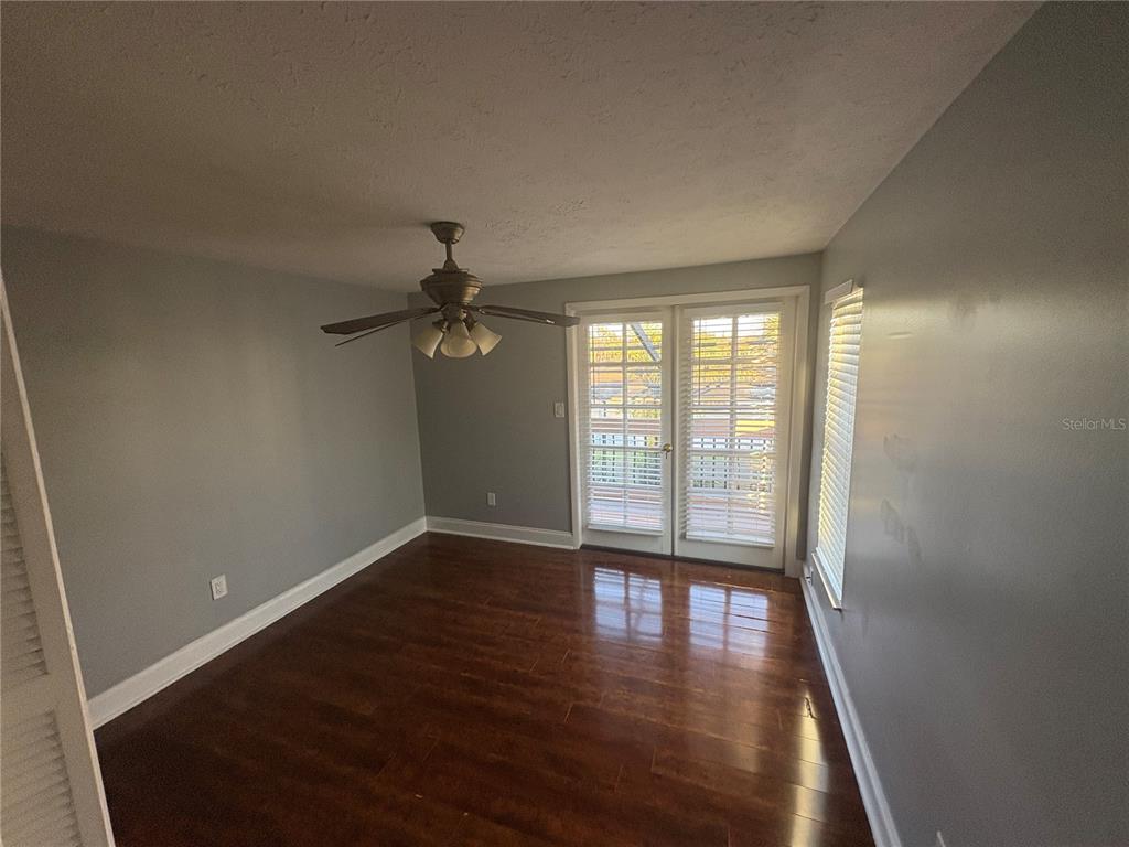 3904 Sweetleaf Drive Brandon, FL 33511 - Photo 30 of 34 wooden floor in an empty room with a window