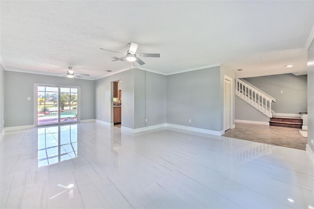3904 Sweetleaf Drive Brandon, FL 33511 - Photo 31 of 66 wooden floor in an empty room with a window