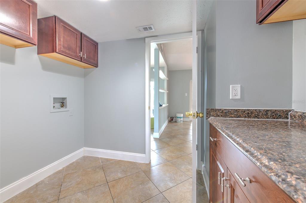 3904 Sweetleaf Drive Brandon, FL 33511 - Photo 36 of 66 a view of a kitchen cabinets and a counter place