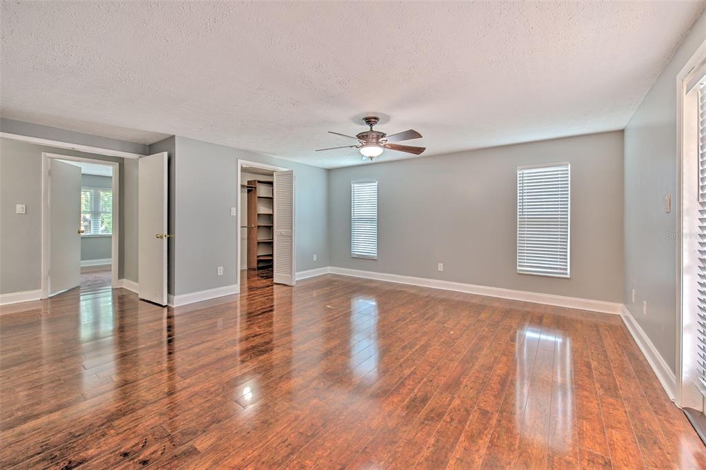 3904 Sweetleaf Drive Brandon, FL 33511 - Photo 48 of 66 a view of an empty room with window and wooden floor