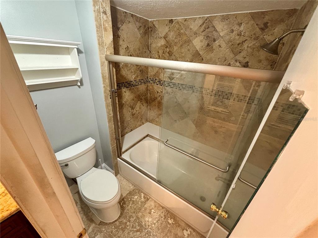 3904 Sweetleaf Drive Brandon, FL 33511 - Photo 50 of 66 a bathroom with a toilet and a shower
