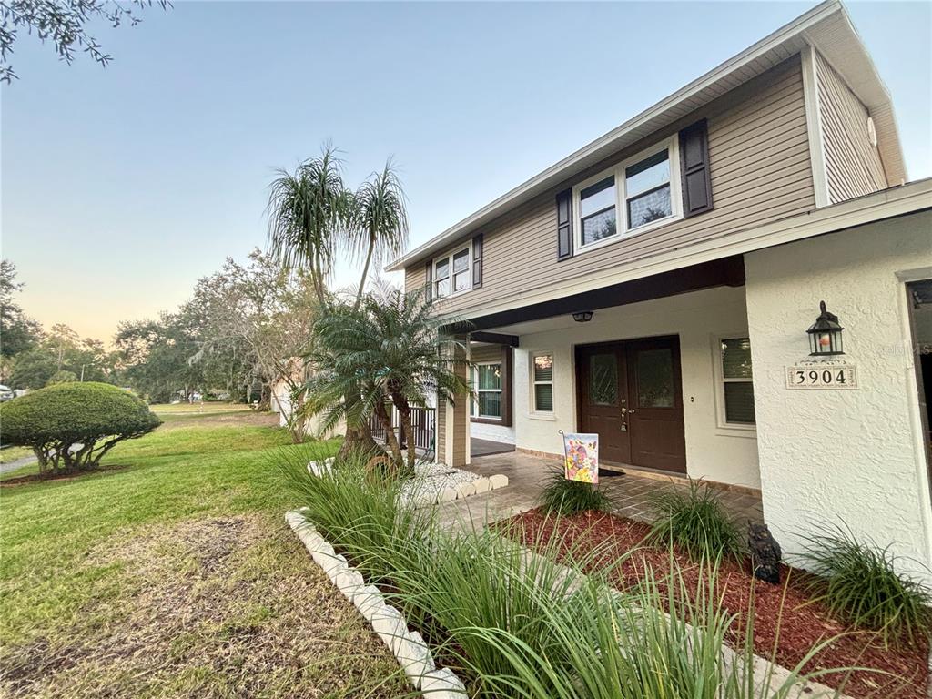 3904 Sweetleaf Drive Brandon, FL 33511 - Photo 5 of 34 a front view of a house with a yard