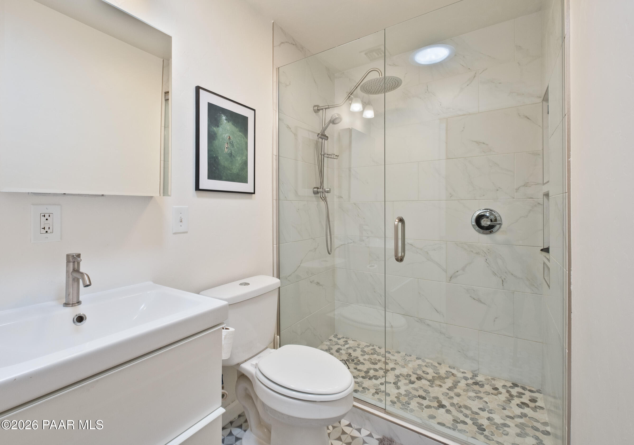 815 Ruth Street Prescott, AZ 86301 - Photo 11 of 30 a bathroom with a sink a toilet and shower
