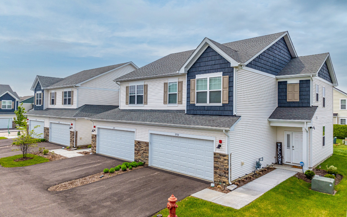 271 Barrett Drive Yorkville, IL 60560 - Photo 1 of 16 a view of a house with a yard and sitting area