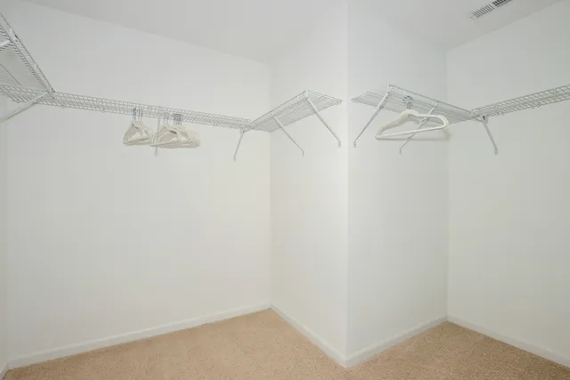 a view of a room with racks on the wall