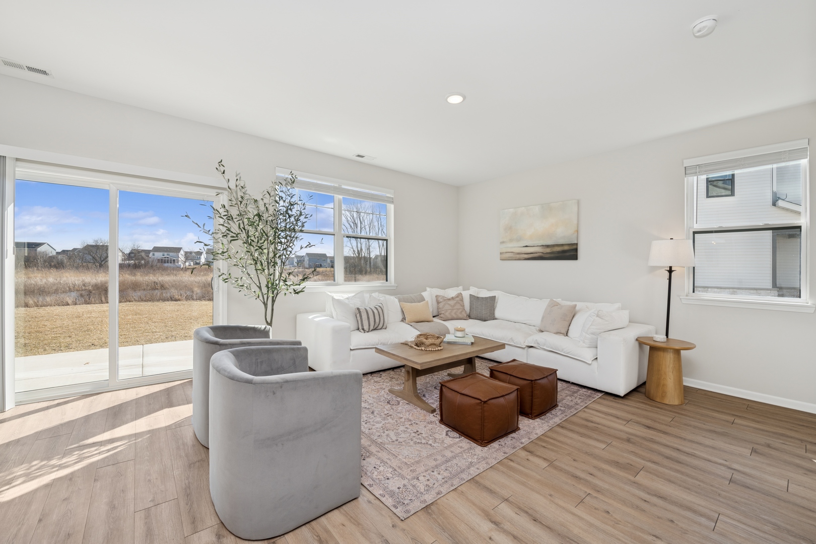 271 Barrett Drive Yorkville, IL 60560 - Photo 4 of 16 a living room with furniture and a large window