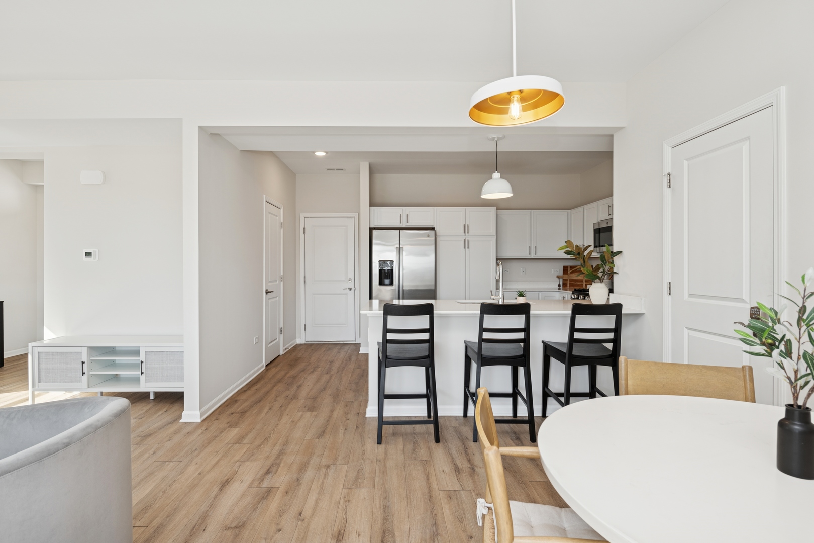 271 Barrett Drive Yorkville, IL 60560 - Photo 8 of 16 a kitchen with a table and chairs