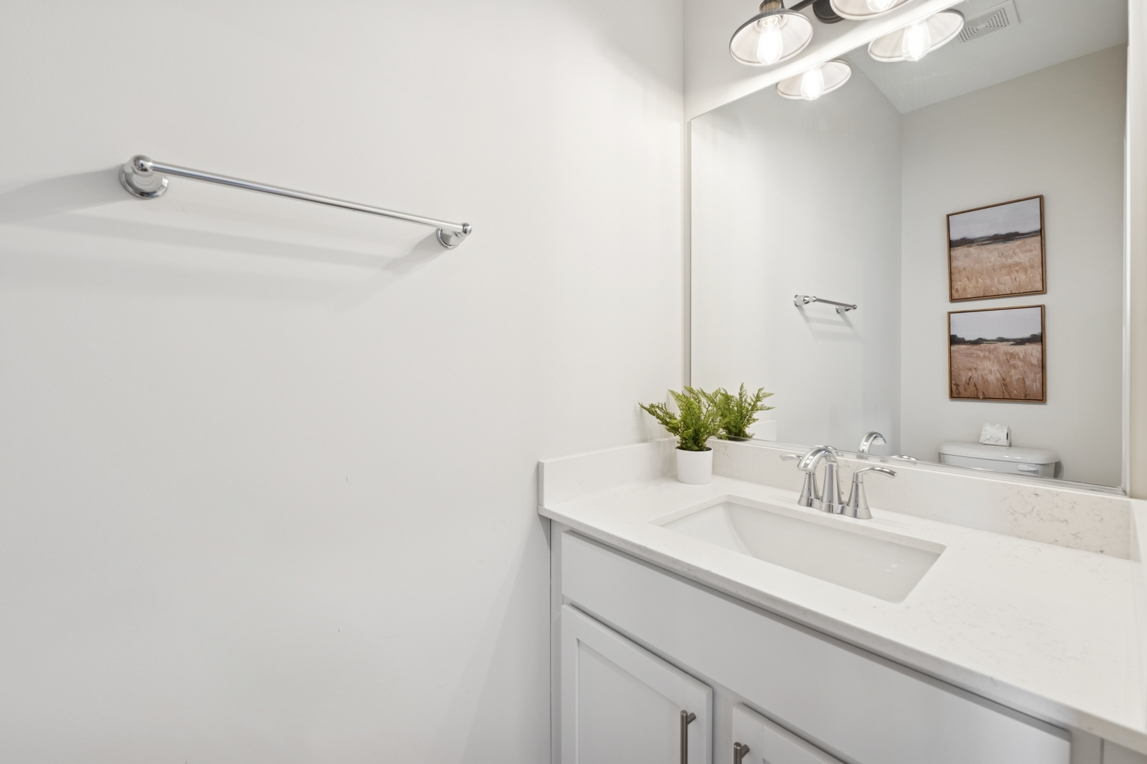 271 Barrett Drive Yorkville, IL 60560 - Photo 9 of 16 a bathroom with a sink and a mirror