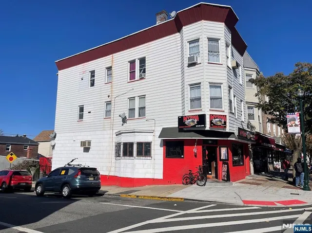 a view of a cars parked in front of a building