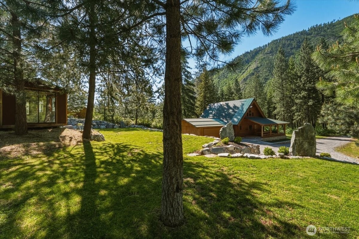 2250 First Crk Road Chelan, WA 98816 - Photo 35 of 39 a view of a swimming pool with a patio