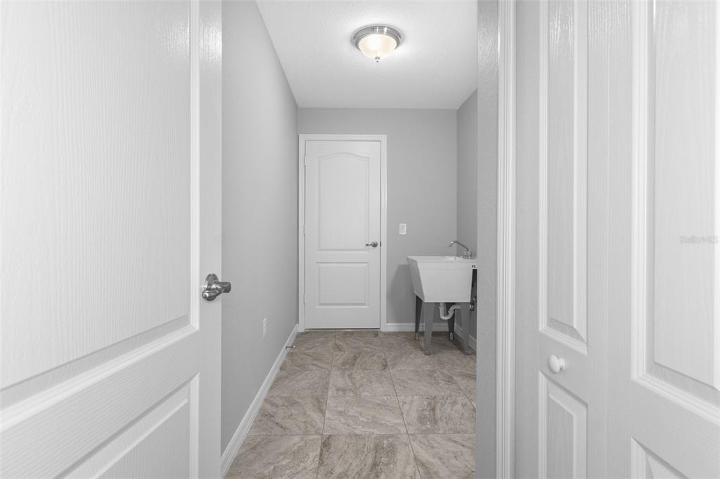 2492 Lackland Avenue Spring Hill, FL 34608 - Photo 28 of 30 a view of a room with a furniture and a window