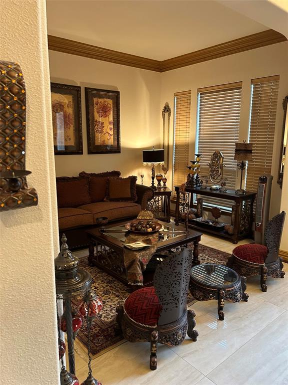 2219 Longview Road Irving, TX 75063 - Photo 12 of 36 a living room with furniture and wooden floor