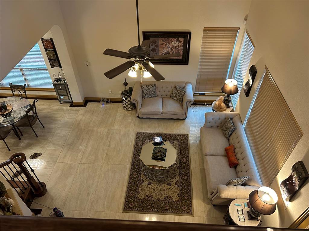 2219 Longview Road Irving, TX 75063 - Photo 23 of 36 a living room with furniture and a window