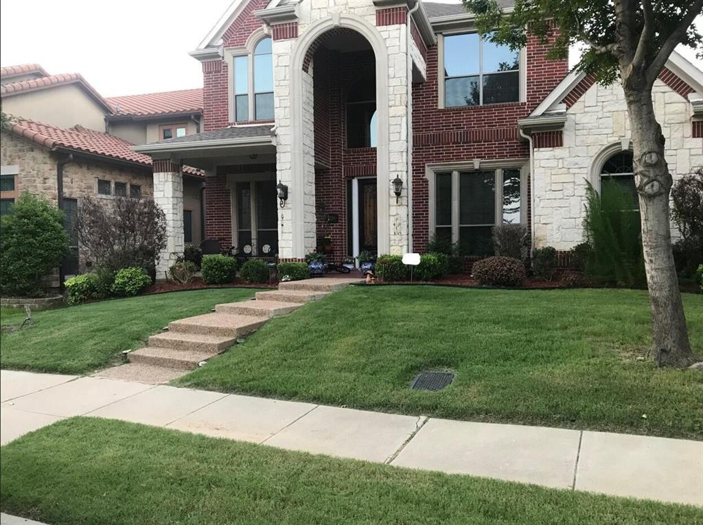 2219 Longview Road Irving, TX 75063 - Photo 3 of 36 a front view of a house with garden