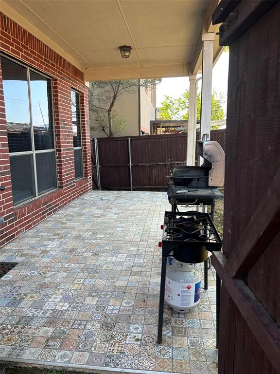 2219 Longview Road Irving, TX 75063 - Photo 34 of 36 a living room with furniture and a flat screen tv