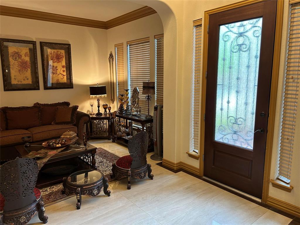 2219 Longview Road Irving, TX 75063 - Photo 10 of 36 a bedroom with furniture and a window