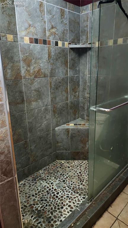 290 Cobblestone Drive Colorado Springs, CO 80906 - Photo 11 of 30 a bathroom with a shower