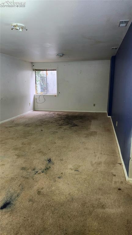 290 Cobblestone Drive Colorado Springs, CO 80906 - Photo 19 of 30 a view of an empty room and window