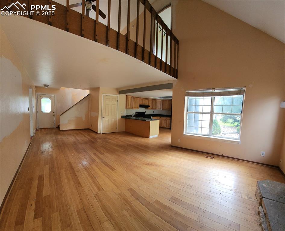 290 Cobblestone Drive Colorado Springs, CO 80906 - Photo 4 of 30 a view of a livingroom with wooden floor