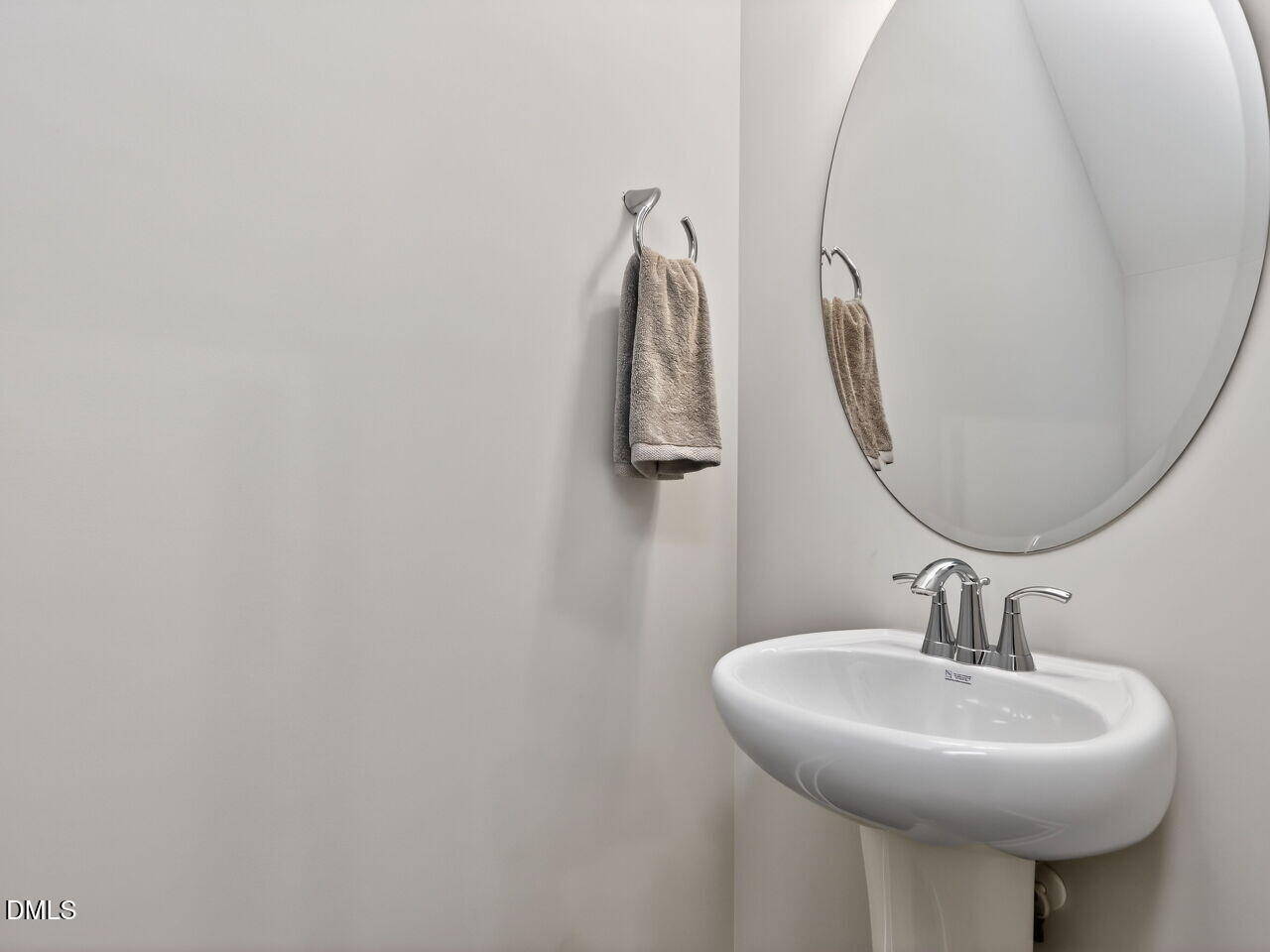 13 Tallgrass Road Pittsboro, NC 27312 - Photo 14 of 34 a bathroom with a sink and mirror