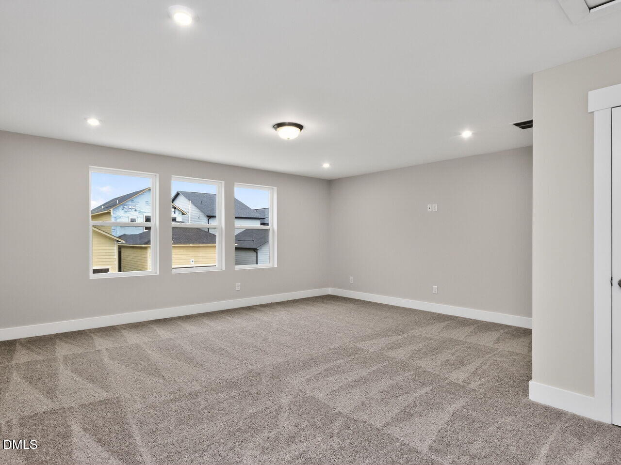 13 Tallgrass Road Pittsboro, NC 27312 - Photo 28 of 34 a view of an empty room with a window