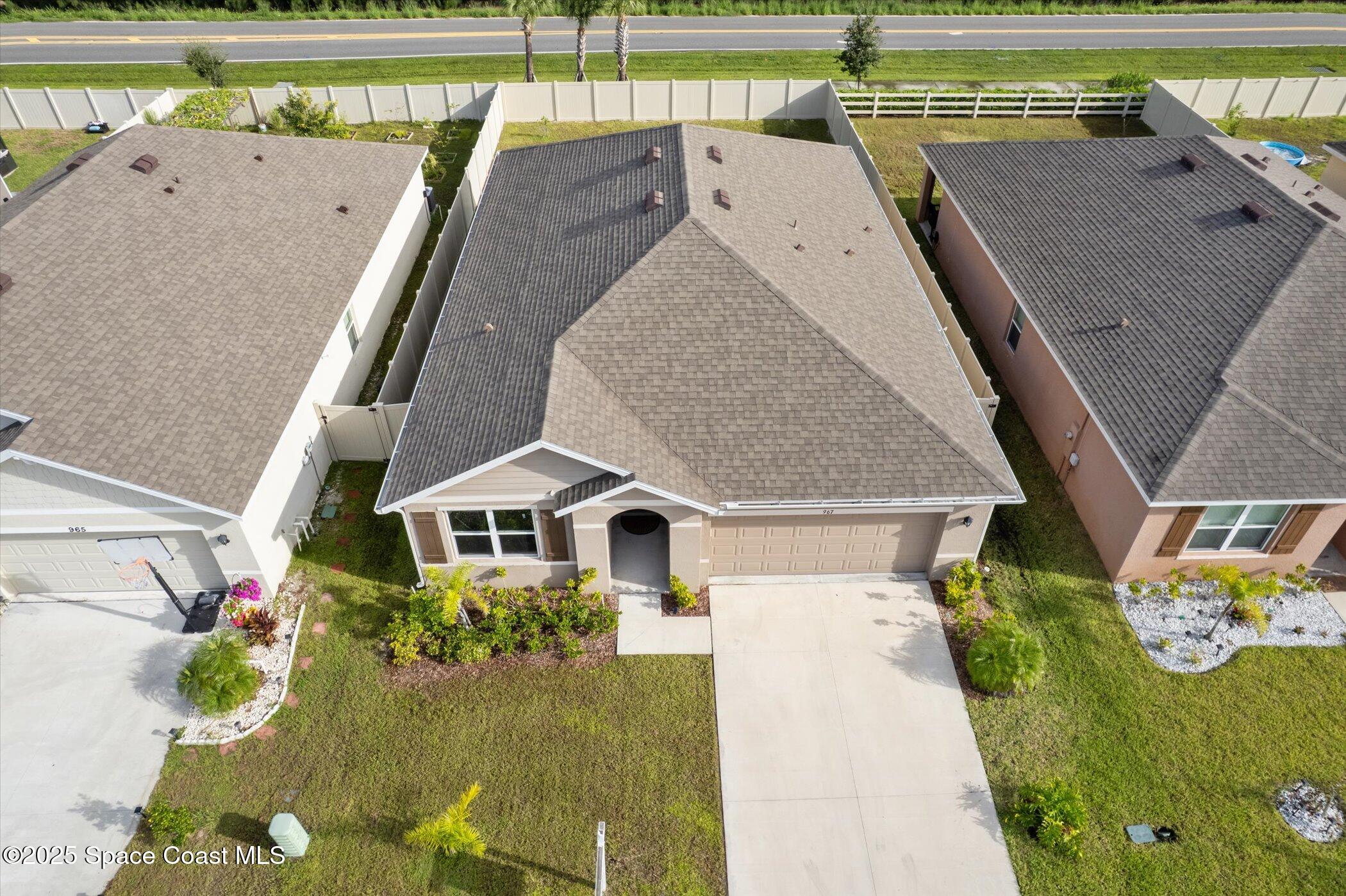 967 Trinity Street Rockledge, FL 32955 - Photo 40 of 40 an aerial view of a house with a yard basket ball court