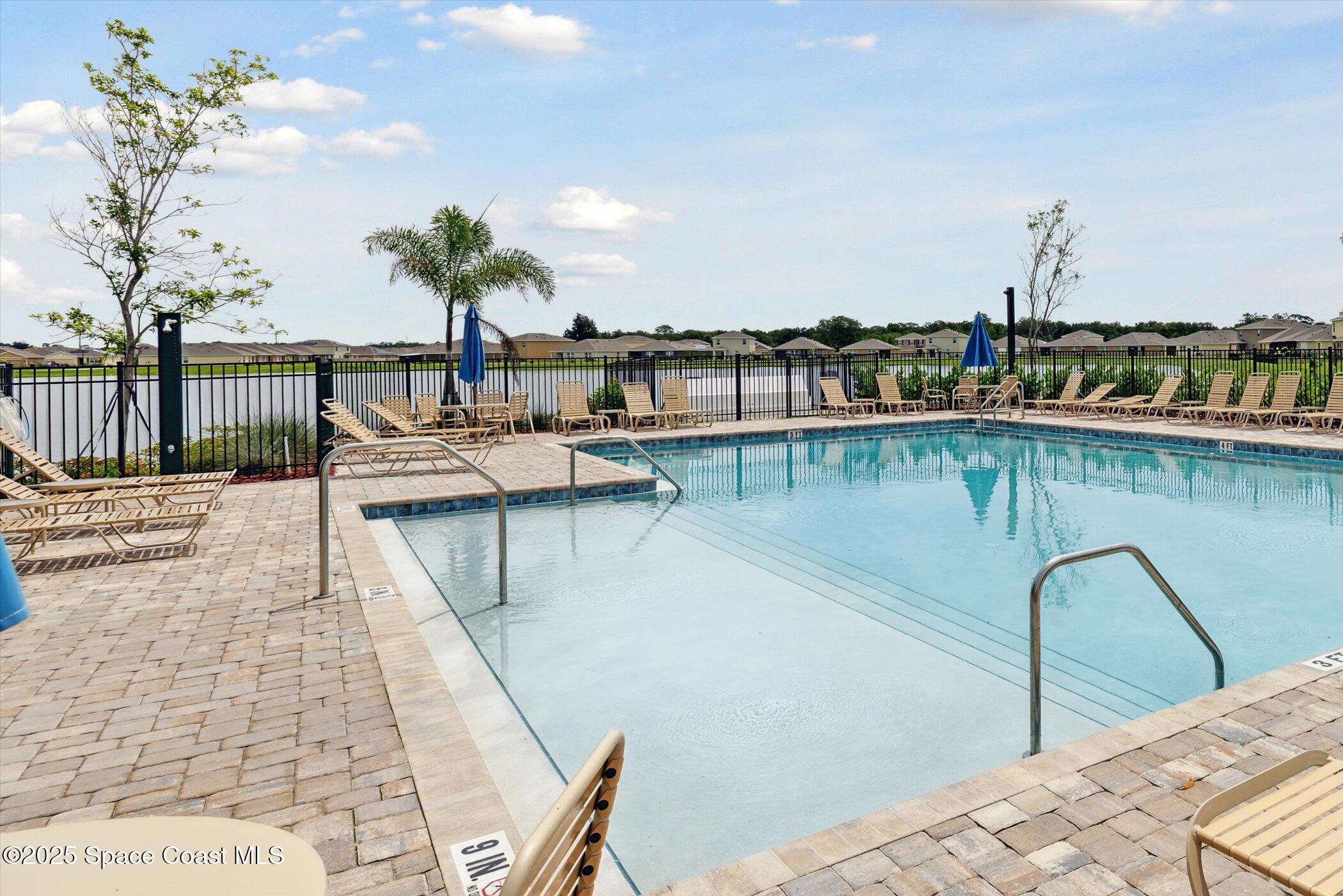 967 Trinity Street Rockledge, FL 32955 - Photo 5 of 40 a view of a lake with a terrace