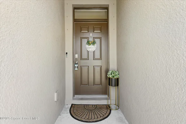 a view of a hallway with seating area
